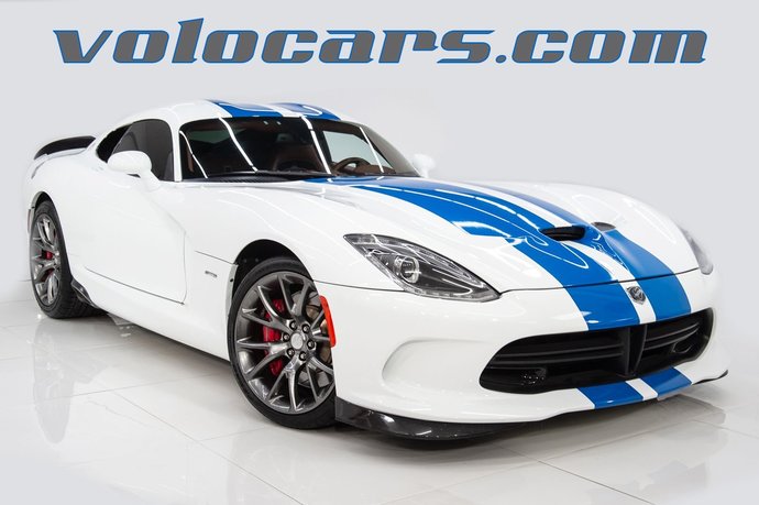 Which of these yellow, orange, white cars for sale by volocars is your favorite?
