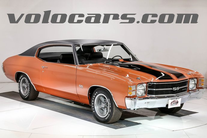 Which of these yellow, orange, white cars for sale by volocars is your favorite?