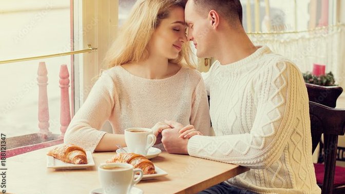 On a dinner/coffee date, is it better to face each other while sitting or sit next to each other?