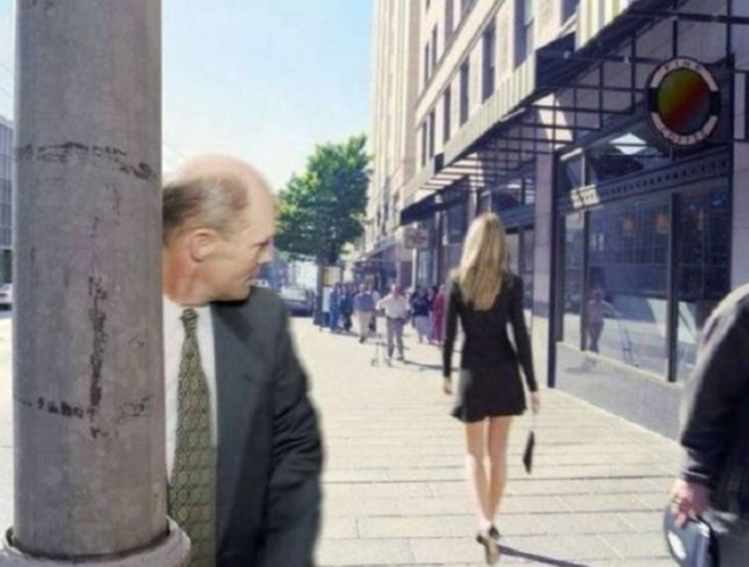 Guy walks into pole looking at pretty girl