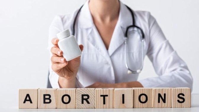Complete the following. "Abortion is... "?