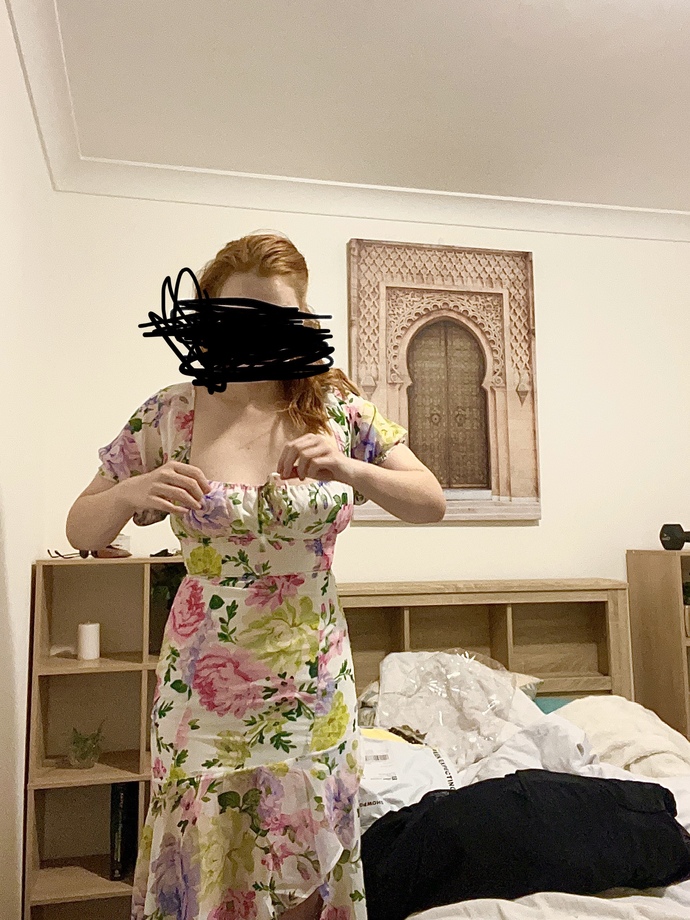 Do you think this dress makes this chick look like a GRANNY?