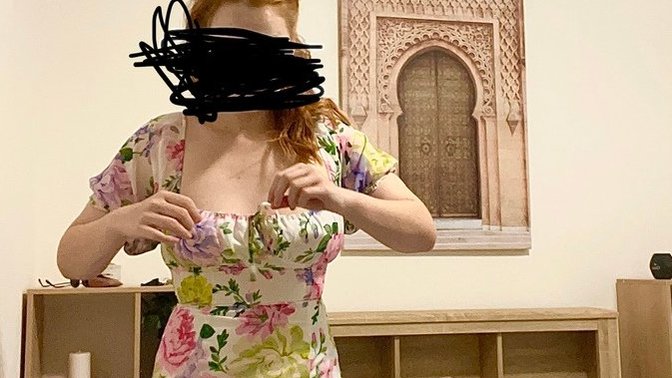Do you think this dress makes this chick look like a GRANNY?