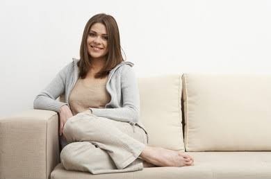 Why do women always put their feet on you when youre sitting next to them on the couch?