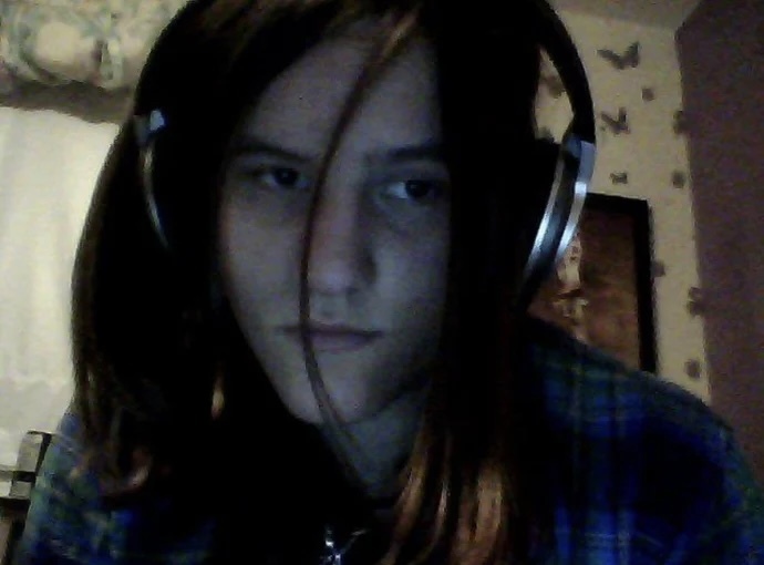 Is this girl or boy with long hair?