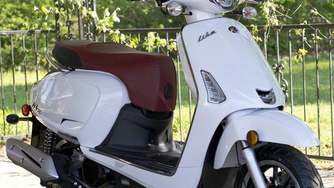 Should I get a 50cc scooter or get my licence and buy a 125cc or more scooter?