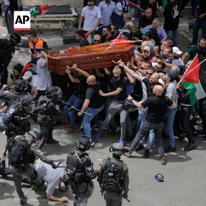Israeli forces beat mourners at the funeral of Shireen Abu Aqleh