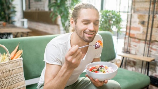 Why aren't more guys vegetarian compared to women?