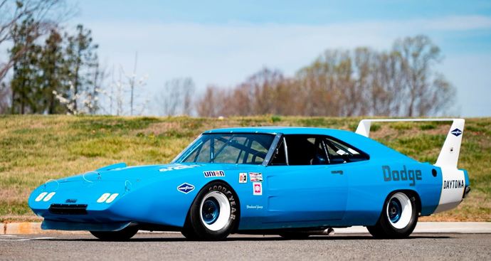 Which of these 7 cars sold at the Indy 2022 Mecum auction is your favorite?