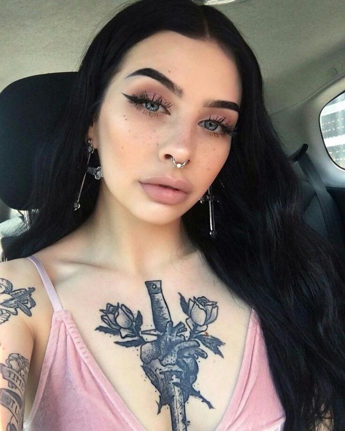 Guys, Do you Guys prefer women with or without tattoos and piercings?