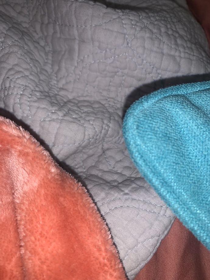 What color curtain can I use to match my bed sheets. I don’t want use coral curtains?