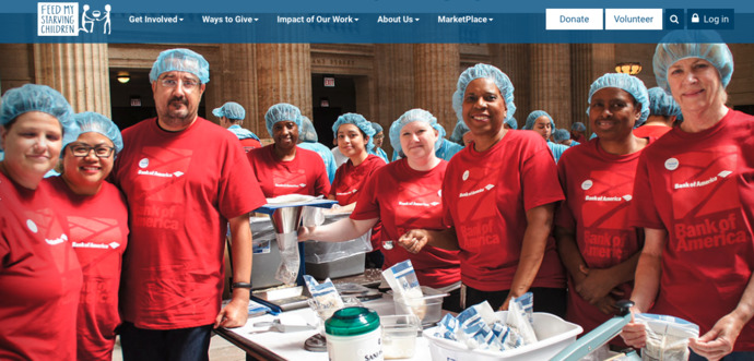 A meal-packing team from Bank of America packing up meals for FMSC. 