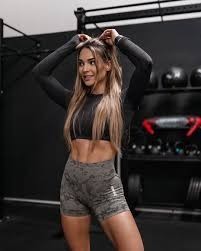 Why do girls do their makeup and hair for their gym workout?