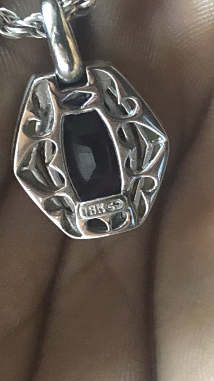 I I bought this some days ago but I’m trying to figure out if my diamonds are real , plus there is a stamp that I’m trying to figure out cc?