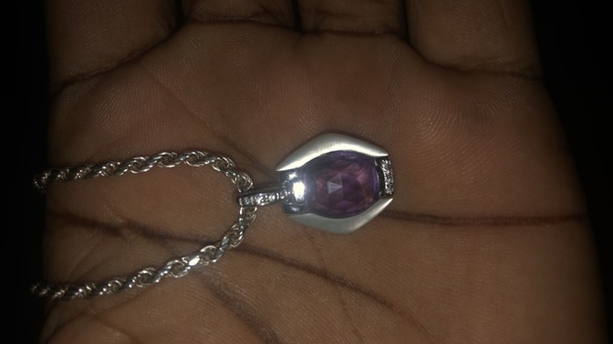 I I bought this some days ago but I’m trying to figure out if my diamonds are real , plus there is a stamp that I’m trying to figure out cc?