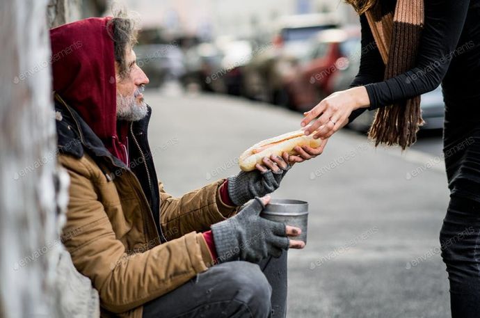 When you see someone giving food to a homeless person what do you tend to think about that person most?