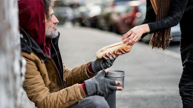 When you see someone giving food to a homeless person what do you tend to think about that person most?