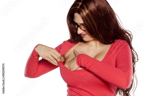 Guys: What do you think and how do you feel when you see a woman adjusting her bra?