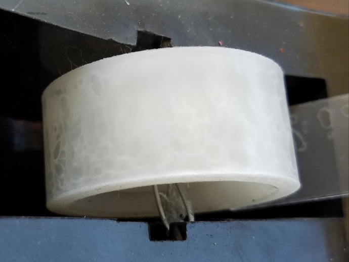 Why goes my Scotch Tape have spots and scales on it?