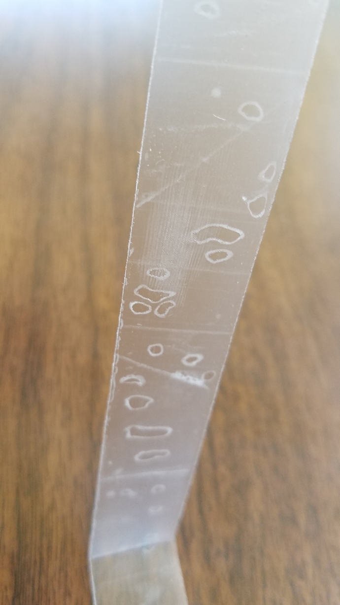Why goes my Scotch Tape have spots and scales on it?