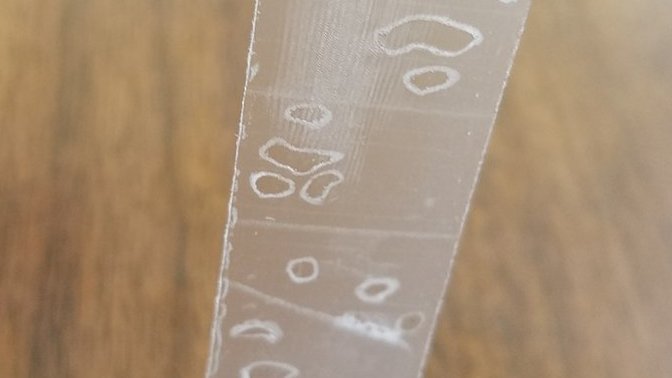 Why goes my Scotch Tape have spots and scales on it?