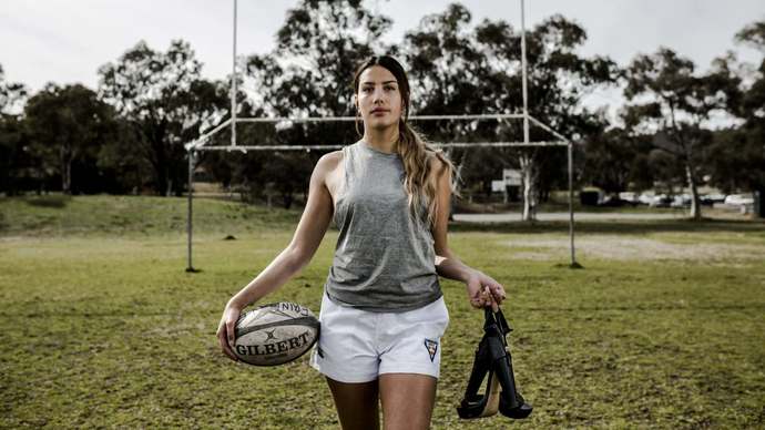 What does it mean if a guy tells a girl out of nowhere that she’d be a good rugby player/wrestler?