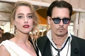 Amber Heard based feminism : why do men date someone half their age?