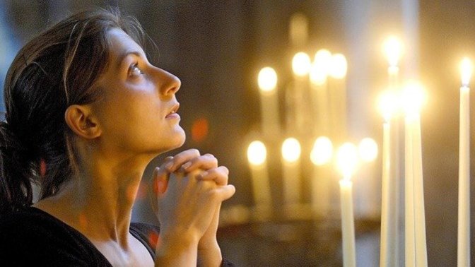 Why are women more likely to be religious than men?