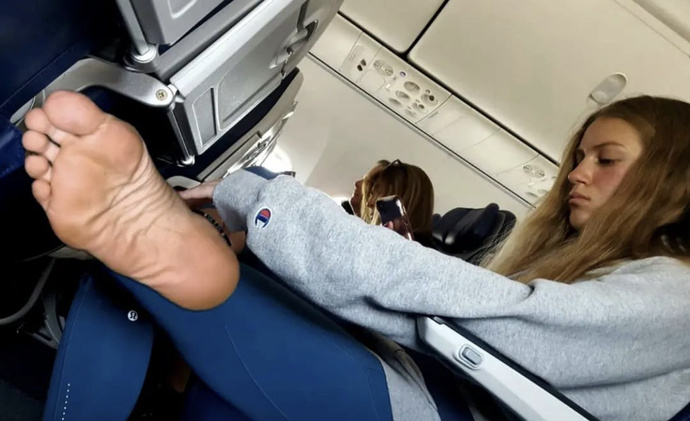 Is this acceptable behavior on a flight?