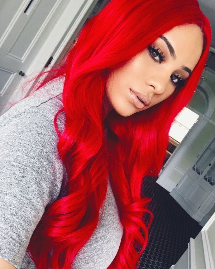 Do dyed red hair make women look old and tired?