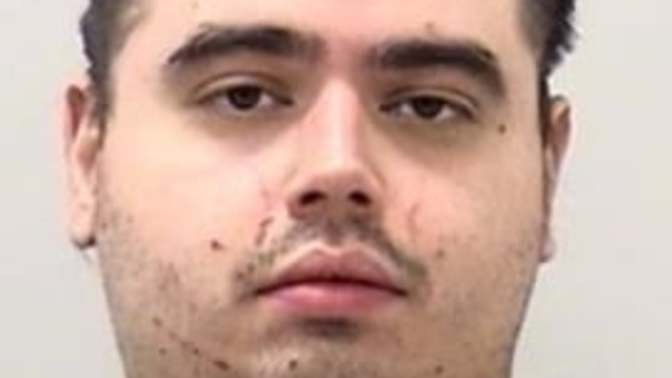 What is the race of the man who allegedly killed a 17 year old co-worker?