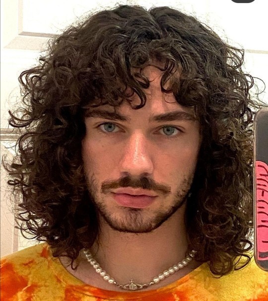 Is long curly hair on men attractive?