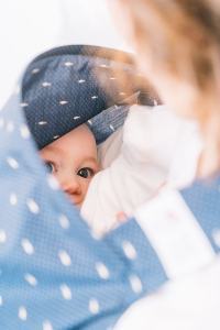 What do you think of women who use cover-ups while breastfeeding in public?