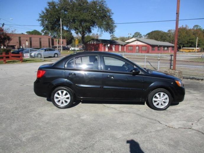 Whats a better girlfriend material car, a 2011 Kia Rio LX or a 2011 Lincoln Town Car Executive L?