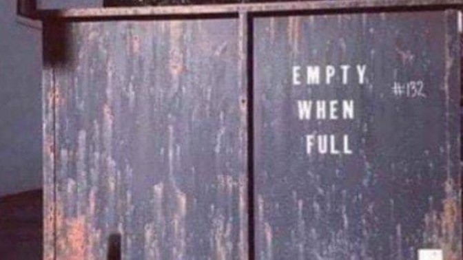 If a dumpster says "empty when full" which one is it?