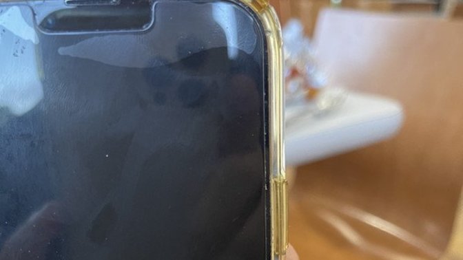 Does anyone know what are these strange bubbles on my friend's IPhone screen?