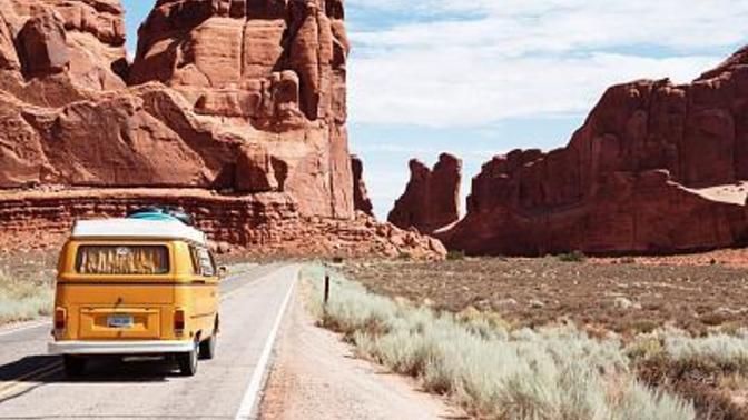 What are some things to help someone stay awake while driving on a road trip?