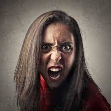 What does it mean when a girl looks at you with her mouth open, and showing you her teeth?