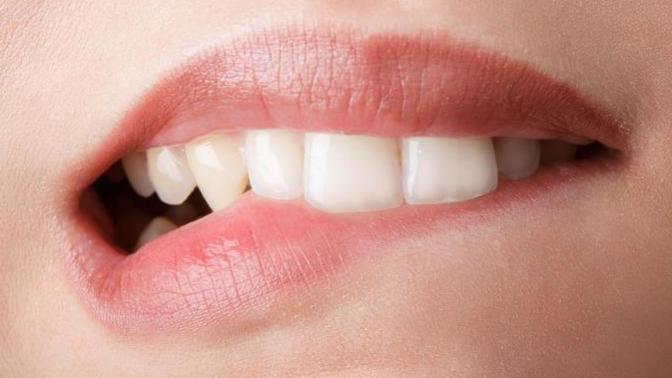Do you ever BITE your LIP while chewing?