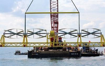 The device gets submerged and the blades generate power from the tide. 