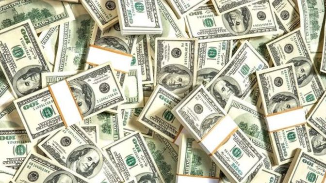 If creating money causes it to lose value, why is the US Dollar Index at more than a 15 year high?