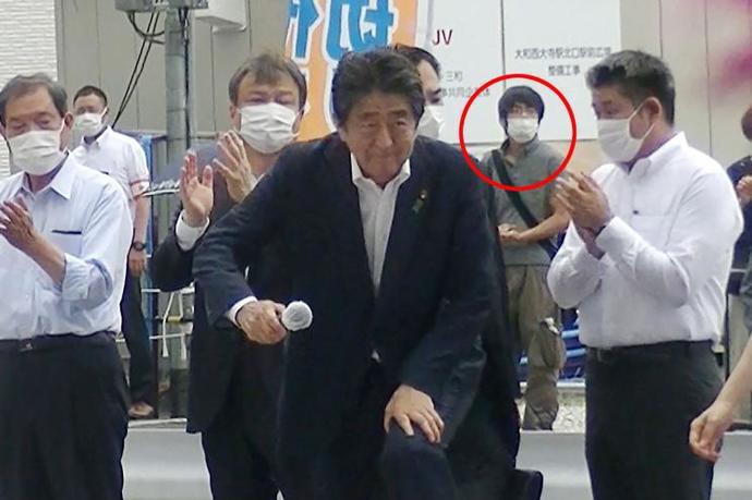 He was assassinated moments after this photo