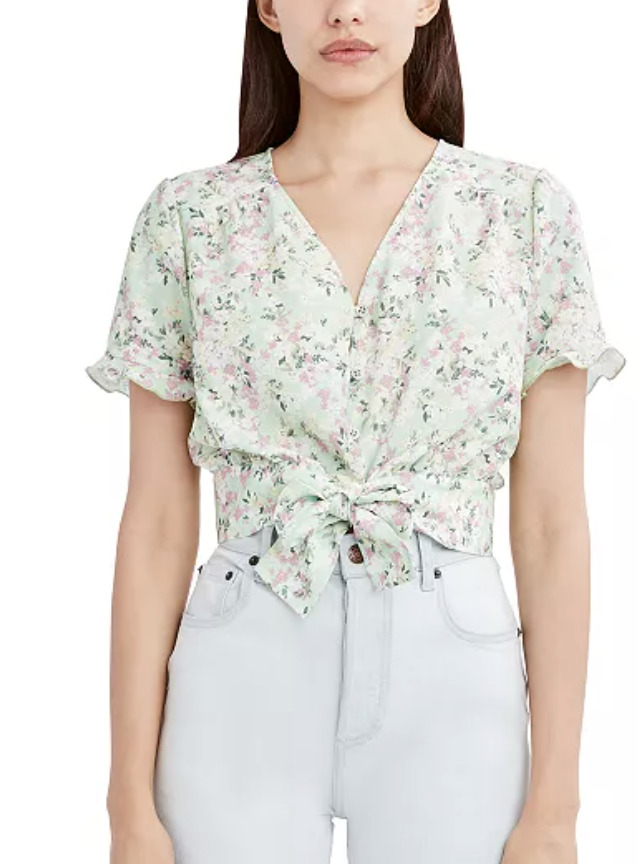 Which floral green top looks prettier?