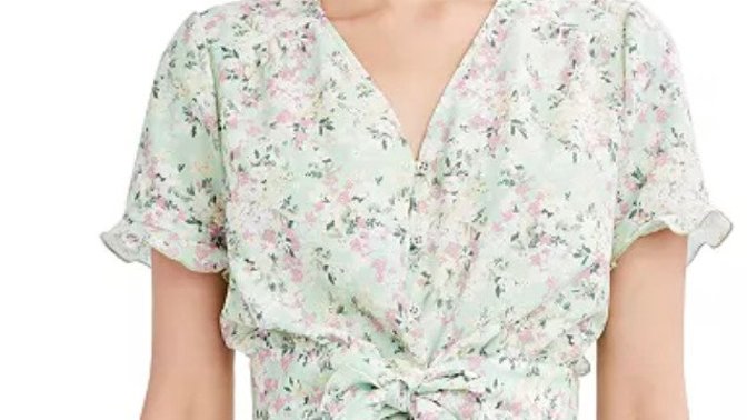 Which floral green top looks prettier?
