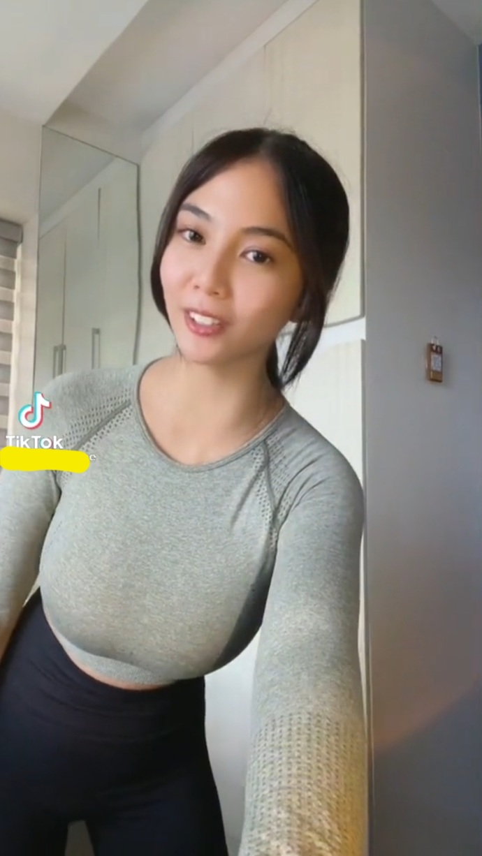 Is she busty based on these photos alone or she just makes it look big by wearing padding, etc. ?