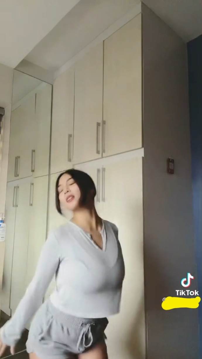 Is she busty based on these photos alone or she just makes it look big by wearing padding, etc. ?