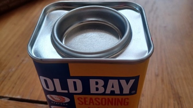 How do I open a can of old bay seasoning?