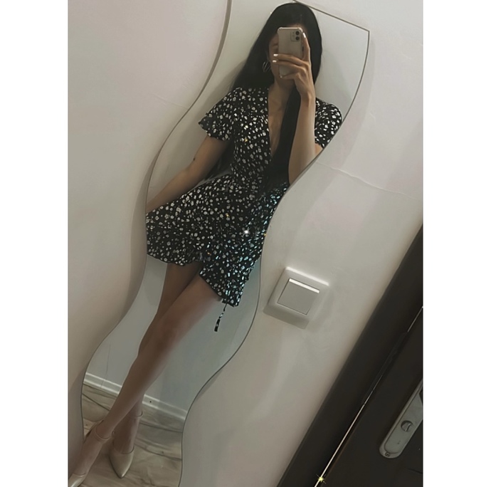 Which dress is more appealing?
