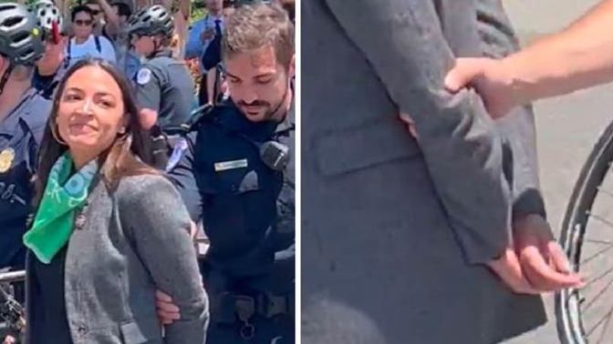 Is AOC really stupid, or was she not actually trying to make it look like she'd been handcuffed?