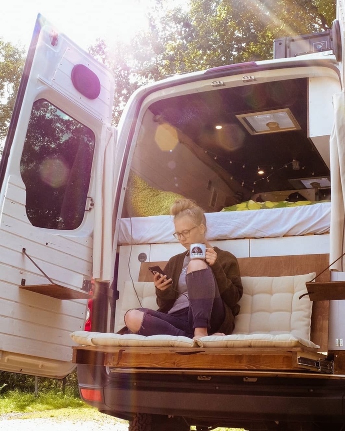 Would you live in a custom van with your partner and travel the world?